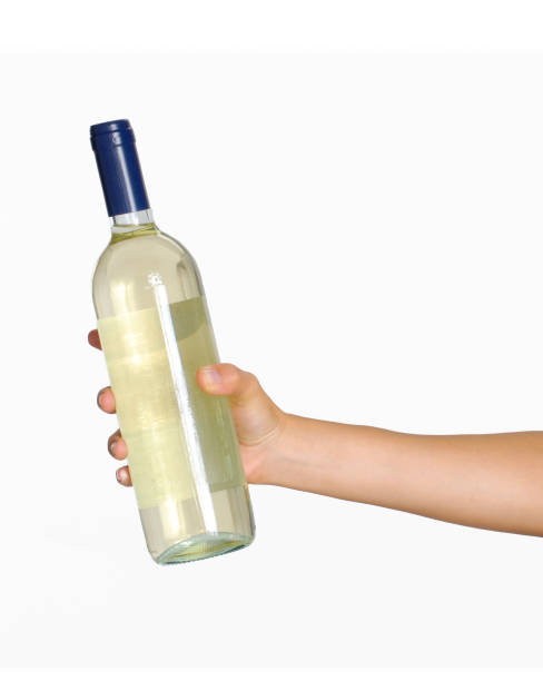 istock Holding the white wine bottle 1469553902