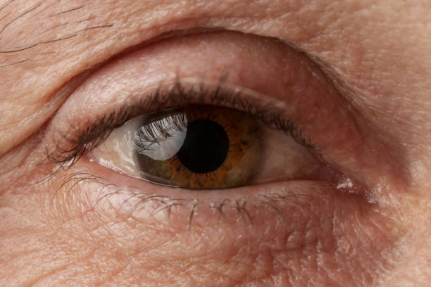 istock Close up image of aged man's eye, looking at camera 1469555348