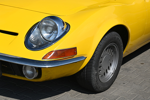 Lublin, Poland - 23th July, 2022: Details of classic Opel GT car. The Opel GT was a front-engine, rear-drive two-seat sports car debuted in 1968.