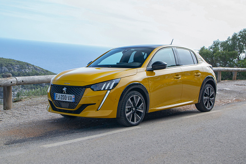 Sitges, Spain - 16th October, 2019: Peugeot 208 stopped on a road. This model is one of the most popular cars in Europe.