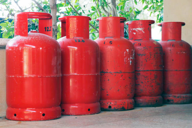 liquid petroleum gas (lpg) cylinders stored in an open chamber for safety purpose - liquified petroleum gas imagens e fotografias de stock