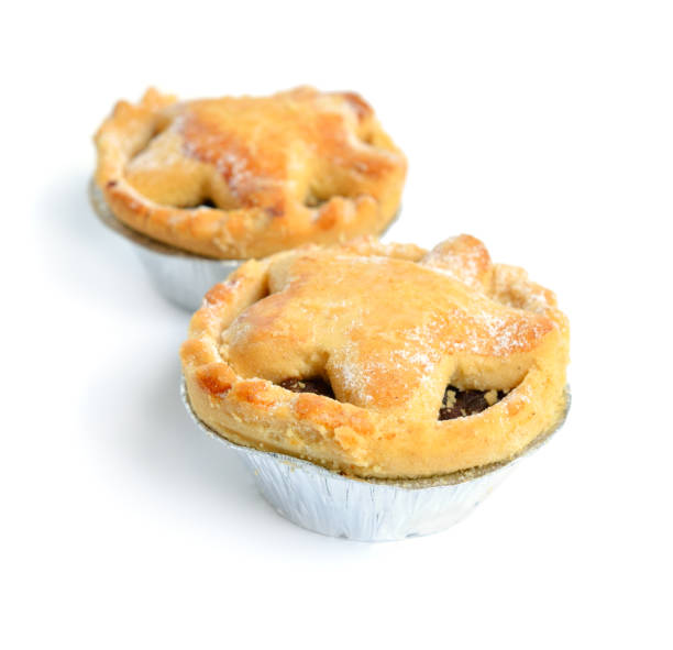 istock Cranberry and chocolate mince pies isolated on white background 1469561415