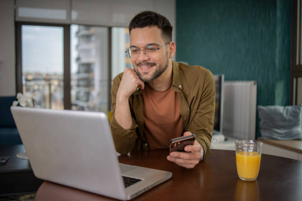 istock Young fashionable man working at home 1469564601