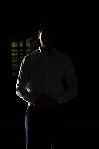 istock Muslim Man Praying In Dark Room 1469566437