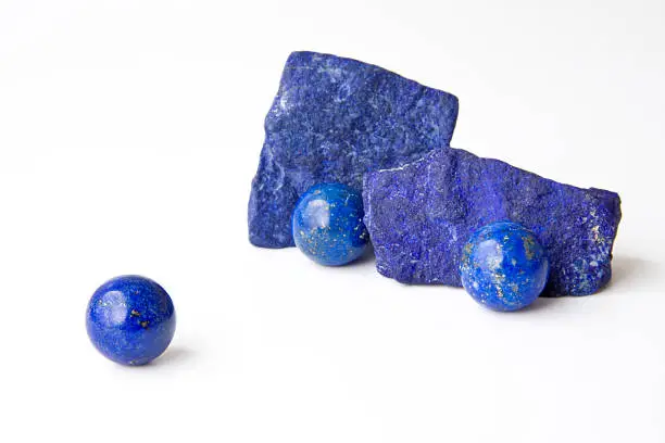 Rich blue Lapis Lazuli spheres and rough from Afghanistan