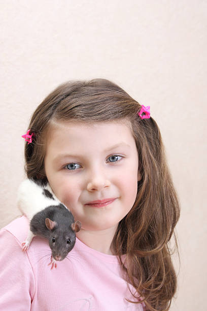 istock girl with rat 146956956