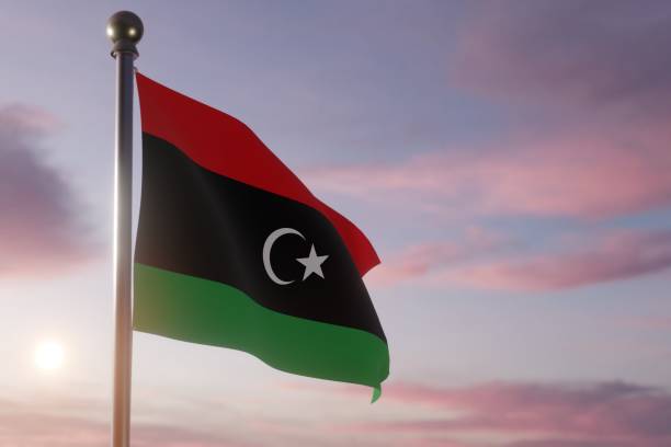 istock Flag at Sunrise or Sunset in the wind  - Libya 1469571355