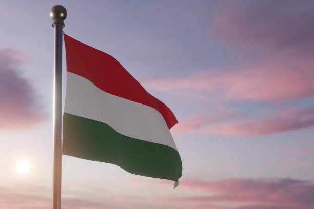 istock Flag at Sunrise or Sunset in the wind  - Hungary 1469571386