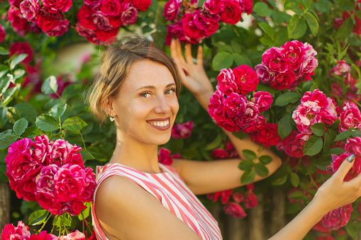 Beautiful woman holding flowers