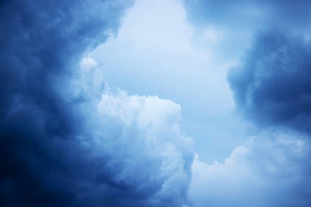 Dramatic sky background. Stormy clouds in the dark sky. Panoramic image can be used as a web banner or wide site header.