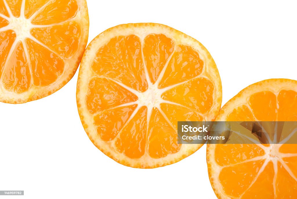 Tre fettine di mandarino - Foto stock royalty-free di Agrume