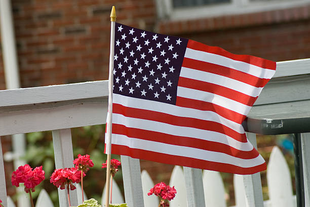 istock Flag, flowers & fence 146960203