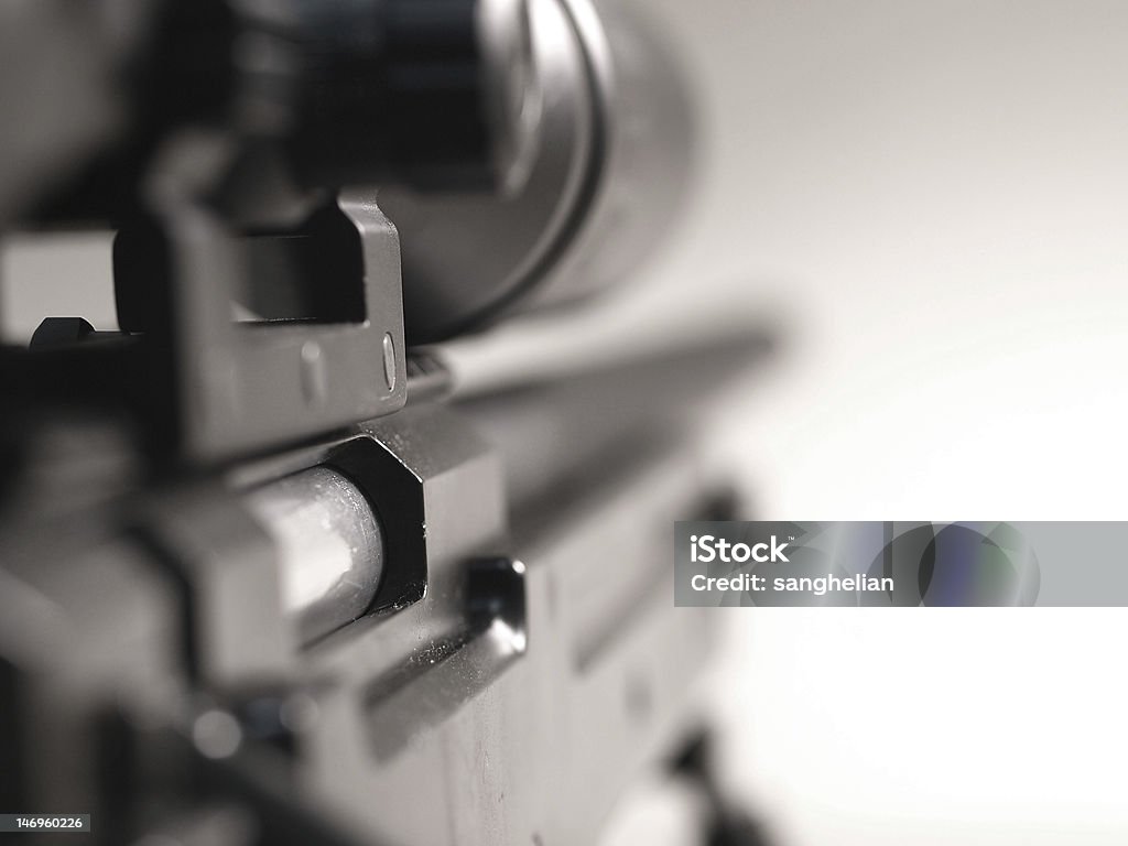 Sniper Rifle Soft-focus macro shot of a sniper rifle isolated on white Army Stock Photo