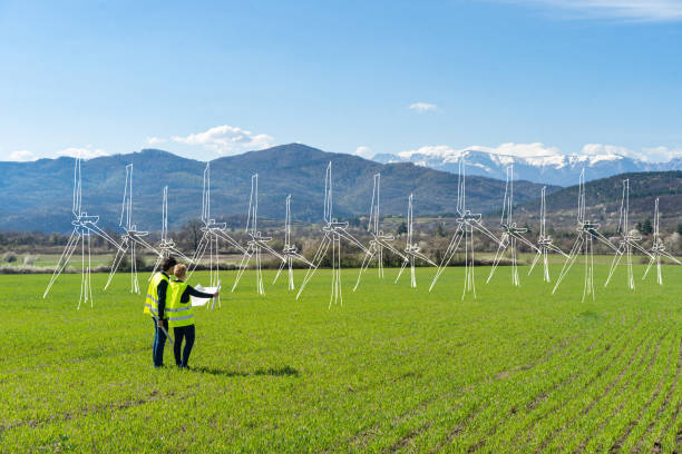 istock Two architects Imagining  wind turbines in a remote location 1469602567