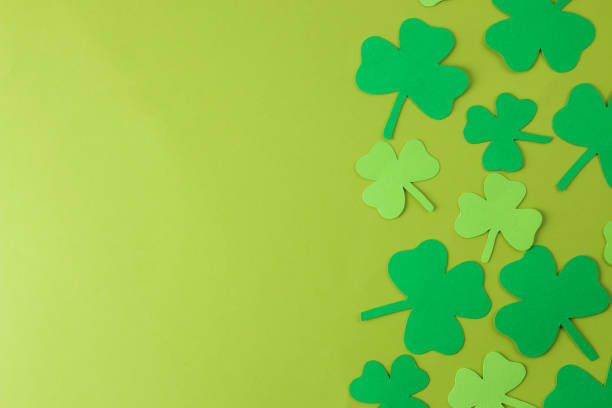 istock St.Patrick 's Day. celebration. frame of green leaf clover on a bright green background. view from above. space for text 1469602718