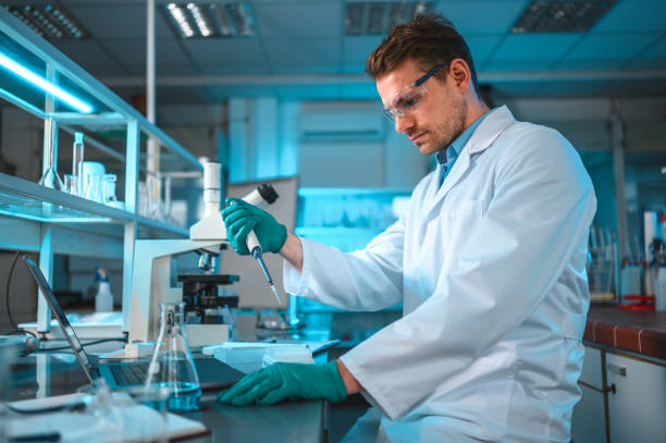 istock Caucasian Bio-Chemist Scientist at the Laboratory 1469604749