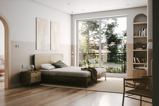 Spacious and airy bedroom interior in beige and white colors.