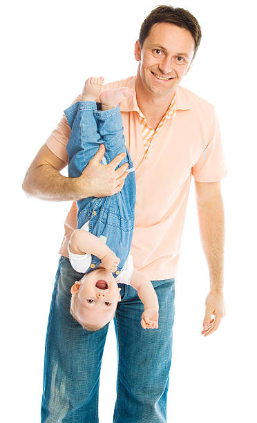 istock father holding his baby upside down 146961291