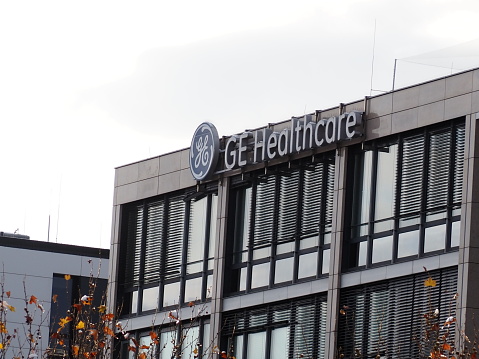 Munich, Bavaria Germany - December 11 2022: General Electric Company Healthcare corporation german headquarters building with the blue logo ultra HD.