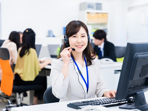 Woman having a remote meeting in the office