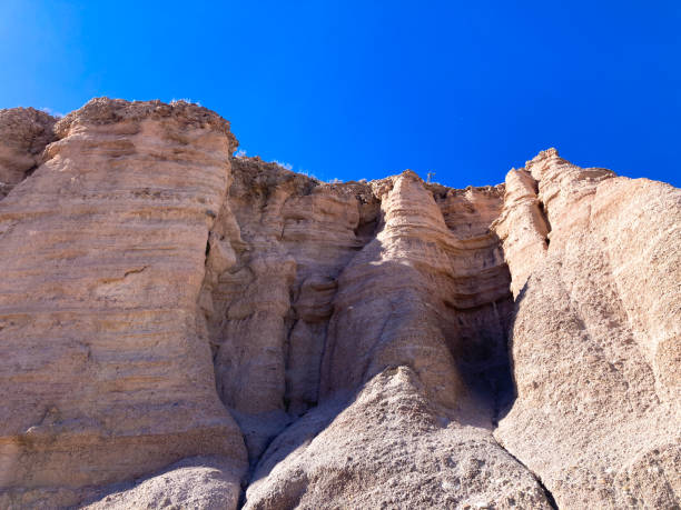Ojo Caliente, NM: Brown Clifts, Vibrant Blue Sky. Copy space available. Ojo Caliente lies between Santa Fe and Taos.