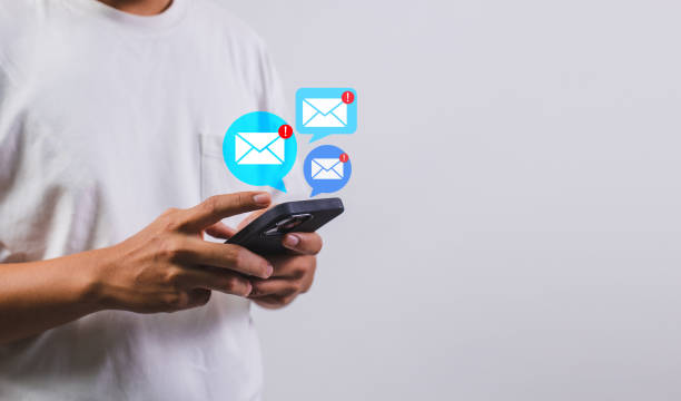 istock Businessman using smartphone with new email alert. Communication connection messages in global workplaces through email marketing or digital newsletter 1469623944