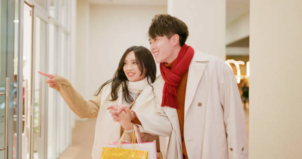 istock asian couple window shopping 1469626522