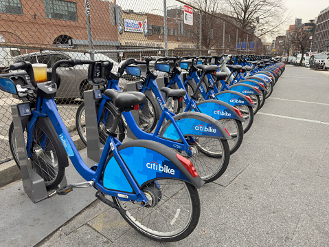 New York City, NY, USA - February 22 2023: Citibike station full of bikes in Brooklyn