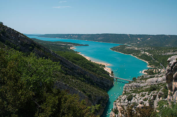 istock Holiday | Blue lake with small boats 146963183