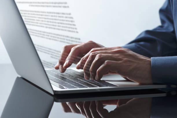 istock Writing business document. Business person using laptop. 1469637153