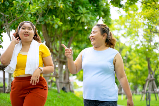 istock Group of people are going to work out at the park. 1469637906