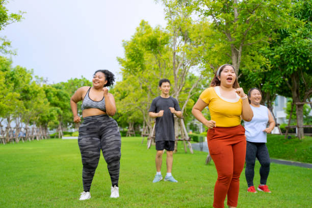istock Group of people are going to work out at the park. 1469637934