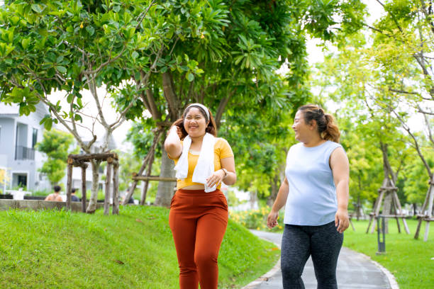 istock Group of people are going to work out at the park. 1469637946