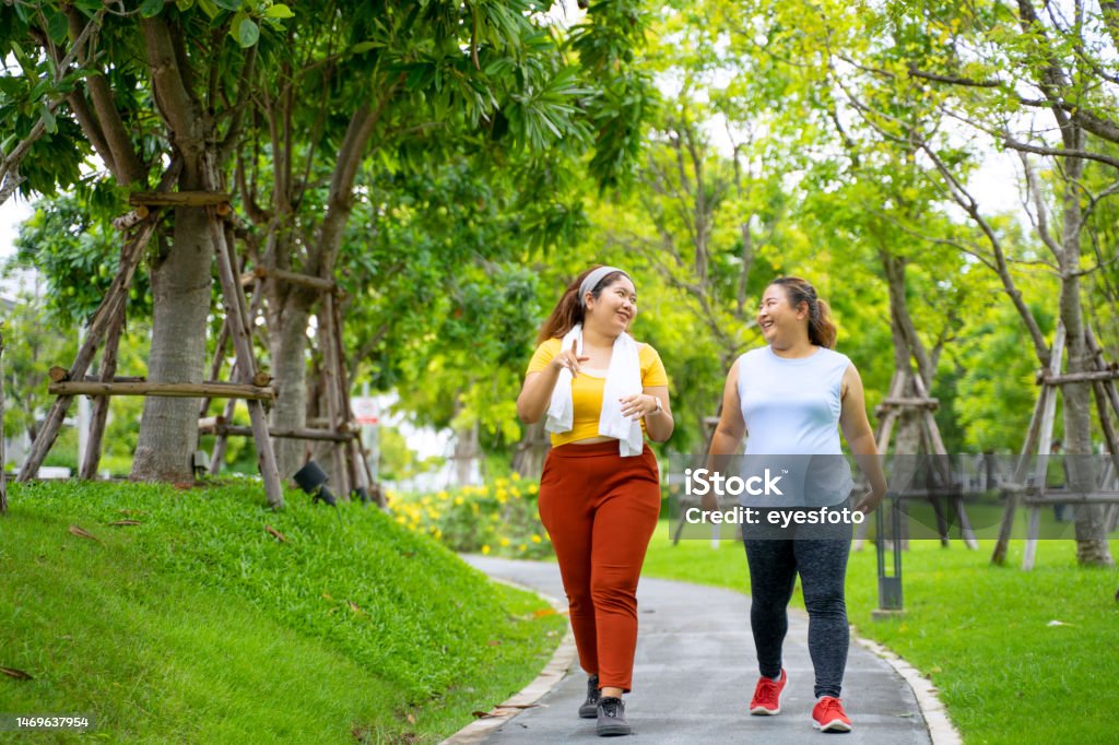 Group of people are going to work out at the park. Group of people are going to work out at the park. Healthy lifestyle concept. Exercising Stock Photo