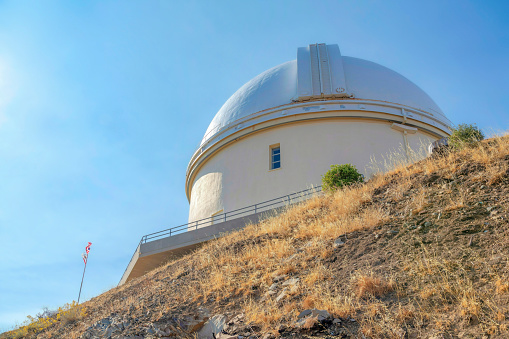 SAN JOSE, CALIFORNIA - CIRCA OCTOBER, 2021: The Lick Observatory research building owned by the University of California. The James Lick Telescope is a refracting telescope built in 1888