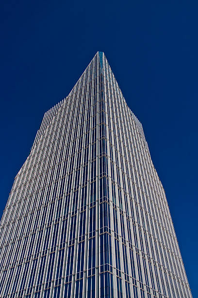 istock Blue Glass and Steel Office Tower in Deep Sky 146964086