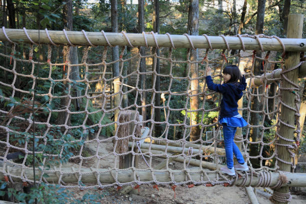 istock Japanese student girl playing with rope walking (8 years old) 1469644753