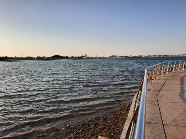 Beautiful evening and colorful sunset at Jeddah, Corniche, Saudi Arabia. Beautiful evening and colorful sunset at Jeddah, Corniche, Saudi Arabia, The Jeddah Corniche, also known as the Jeddah Waterfront, is a coastal area of the city of Jeddah, Saudi Arabia. Located along the Red Sea. saudi arabia jeddah landscape stock pictures, royalty-free photos & images