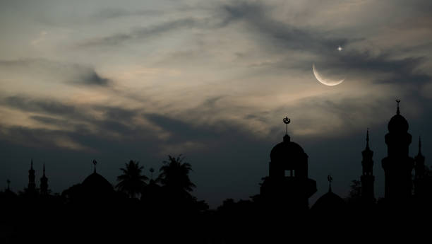 istock Islamic Architecture Celebration Background Concept,Design Ramadan Silhouette Building Mosques Dome,Crescent Moon Sky on Blue Black,New Year Muharram Religion,Arabic,Eid Al-Adha,Mubarak Muslim 1469645776