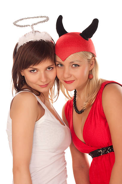 istock angel and devil girls over white 146964656