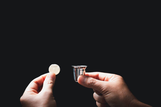 Concept of Eucharist or holy communion of Christianity. Eucharist is sacrament instituted by Jesus. during last supper with disciples. Bread and wine is body and blood of Jesus Christ of Christians. stock photo