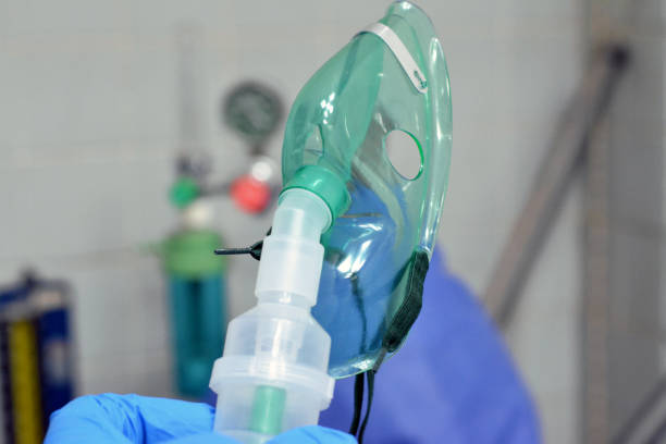 istock A nebulizer or nebuliser mask that is connected to oxygen cylinder or a drug delivery device used to administer medication in the form of a mist inhaled into the lungs used for emergency 1469652278