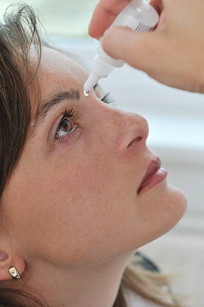 istock Young woman applying eyes drops 146965635