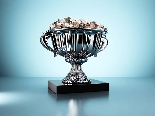 Valuable trophy Trophy full of coins of Euro ganar stock pictures, royalty-free photos & images