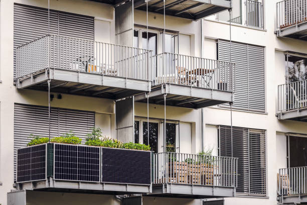 istock Solar Panels on Balcony of Apartment Building 1469661097