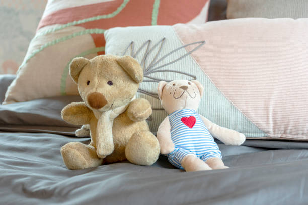 istock Lovely teddy bear on kid bedroom. 1469662385