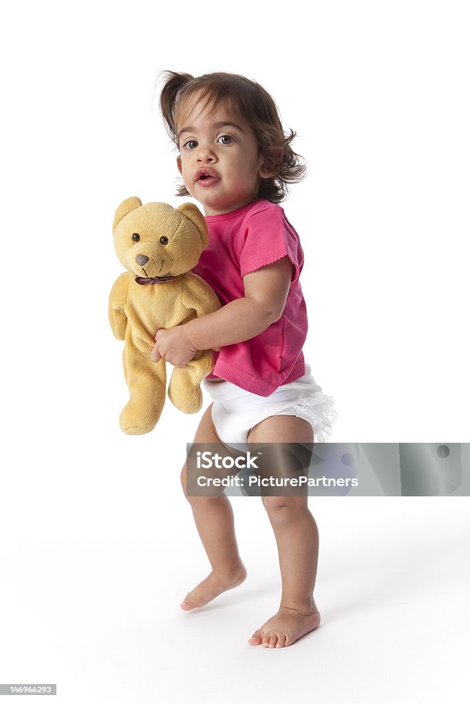 Baby Mädchen gehen mit einer Spielzeug-Bär - Lizenzfrei 6-11 Monate Stock-Foto
