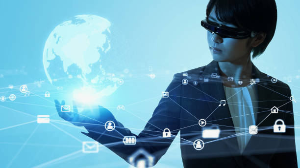 istock Asian woman wearing smart glasses. Head mounted display. Wearable computer. Virtual reality. 1469662952