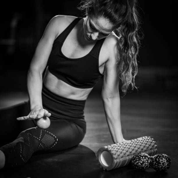 istock Using Duoball, Foam Ball to Self-Massage Muscles in the gym 1469663319