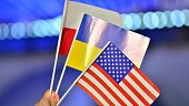 Flags of  Ukraine, USA and Poland. The concept of the Russian invasion of Ukraine.